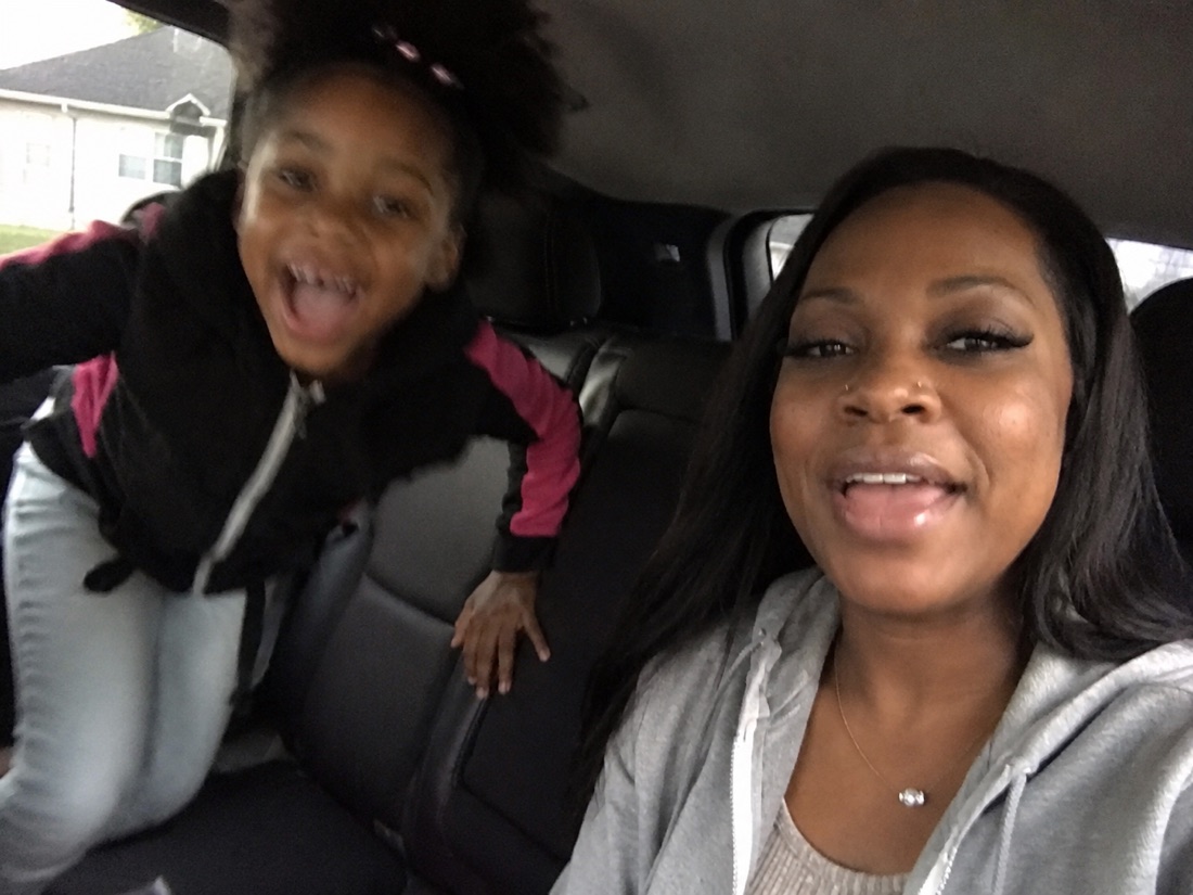 A joyful family moment in a car